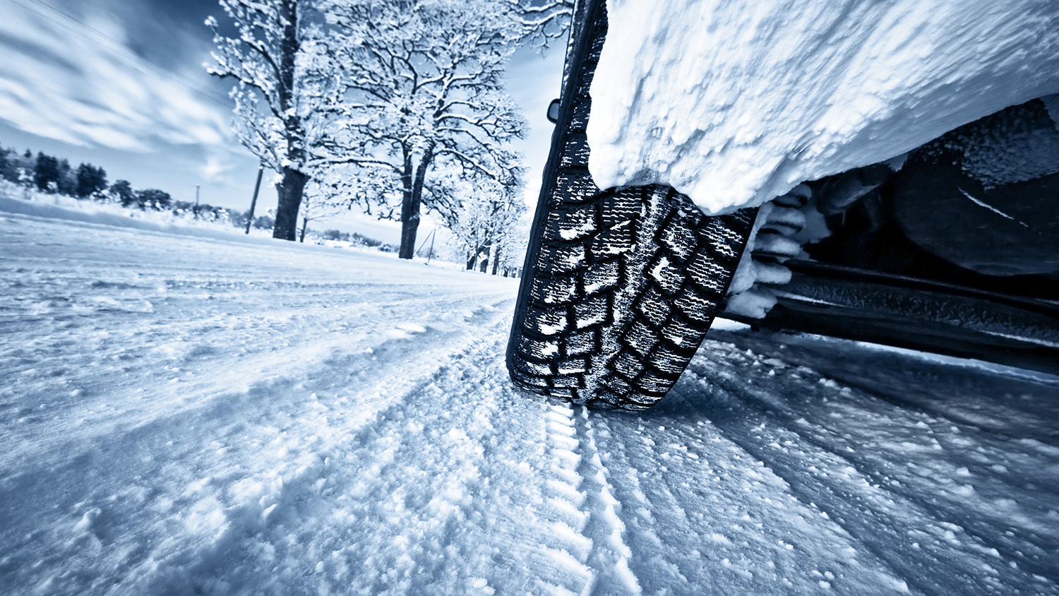 car-tires-on-winter-road.jpg