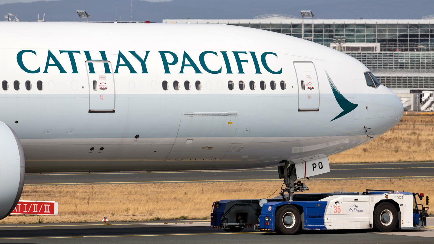 The front end of a Cathay Pacific airplane